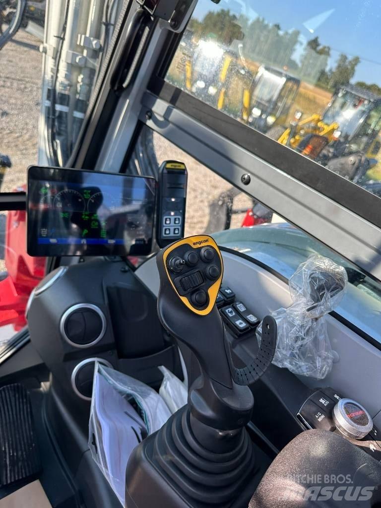 Takeuchi TB 395 W Pelle sur pneus