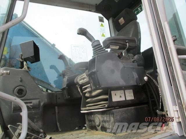 Fuchs MHL 320 Pelle à déchets