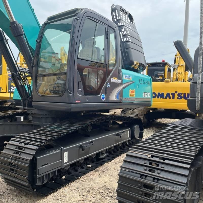 Kobelco SK 210 Pelle sur chenilles