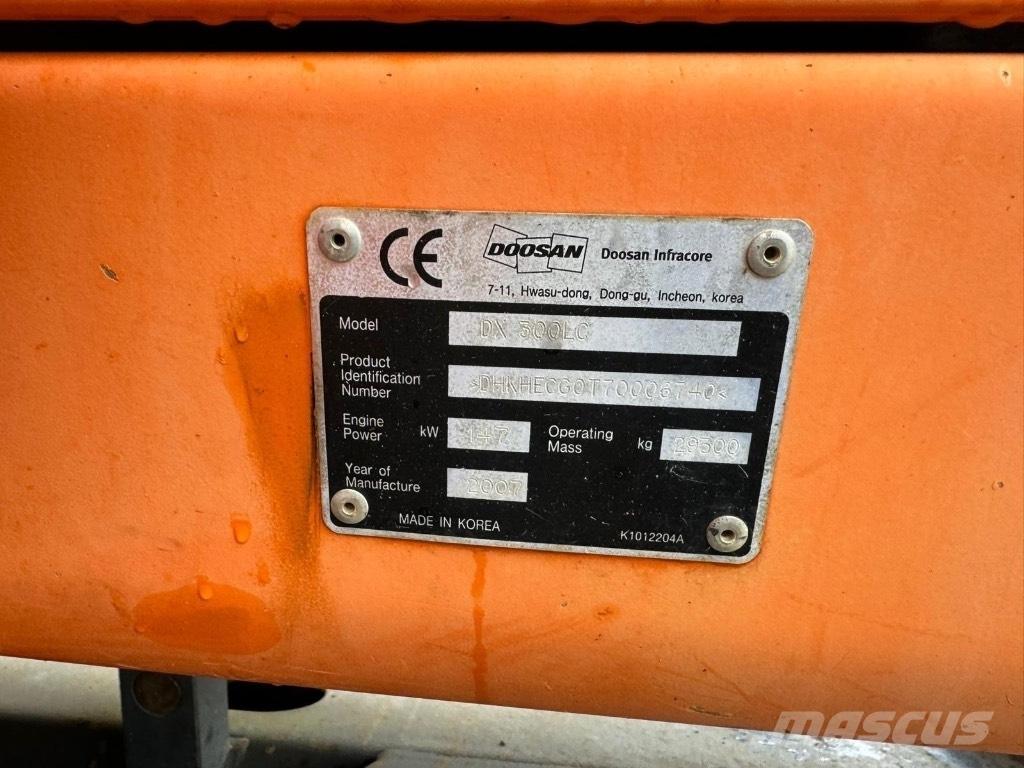Doosan DX 140 Pelle sur pneus