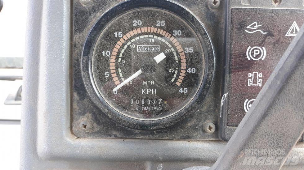 Fermec 860 Tractopelle