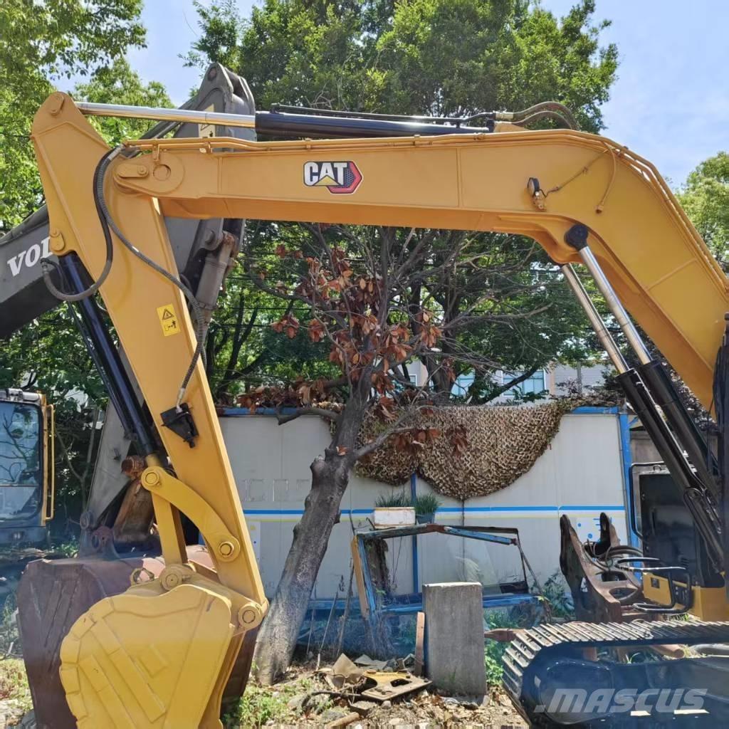 CAT 310 Pelle sur chenilles