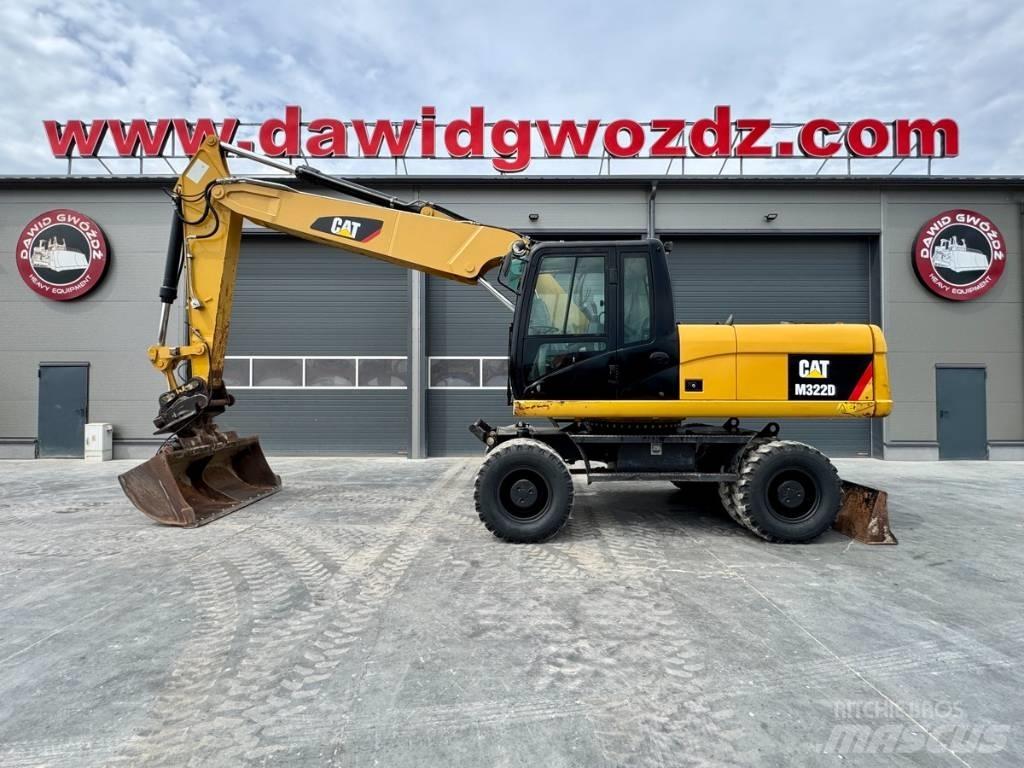 CAT M322D Pelle sur pneus