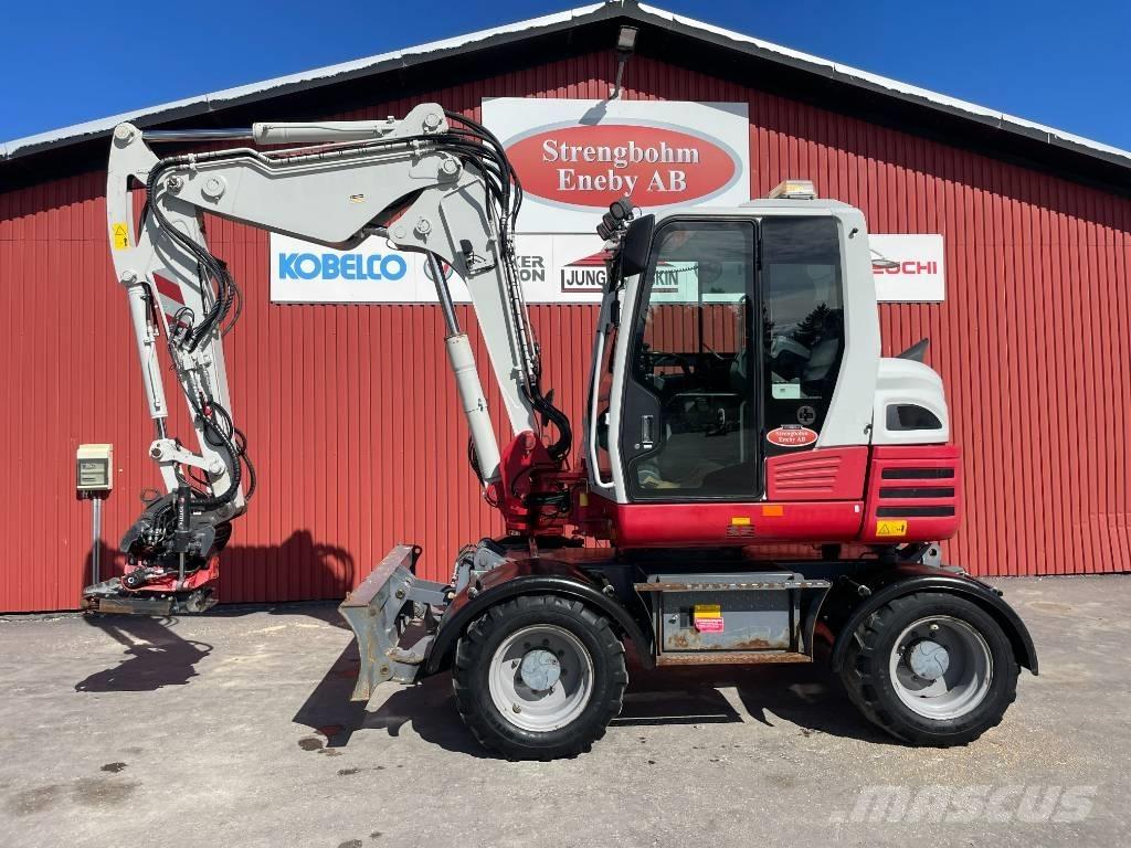 Takeuchi TB 295 W Pelle sur pneus