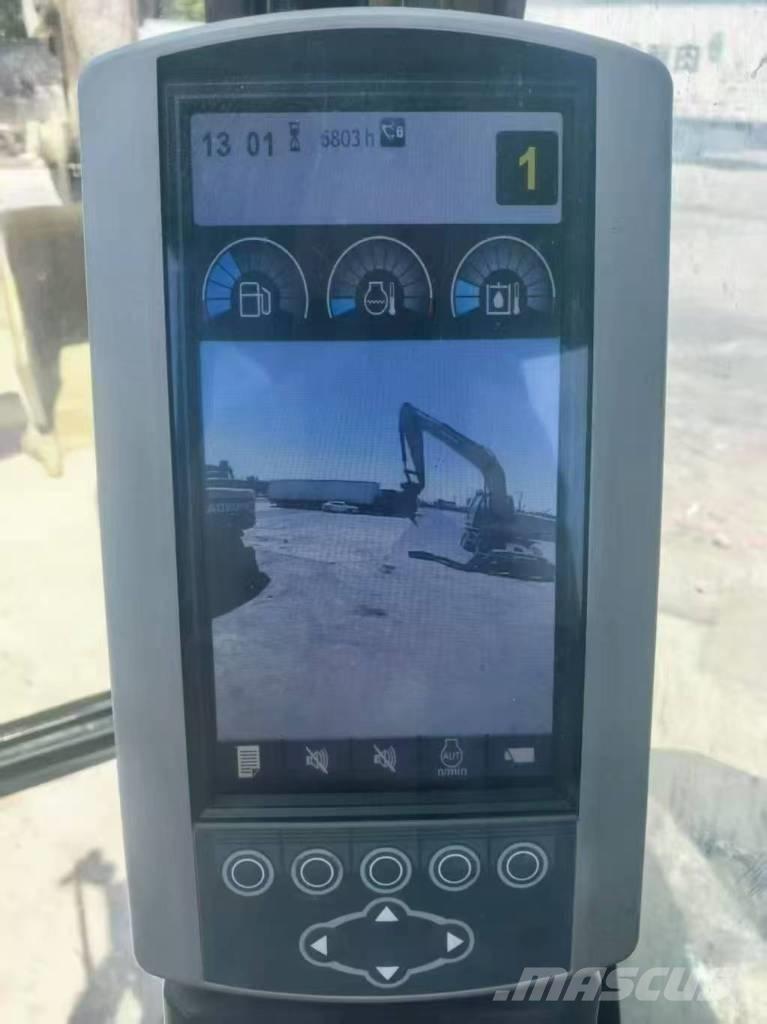 CAT M 315 D Pelle sur pneus