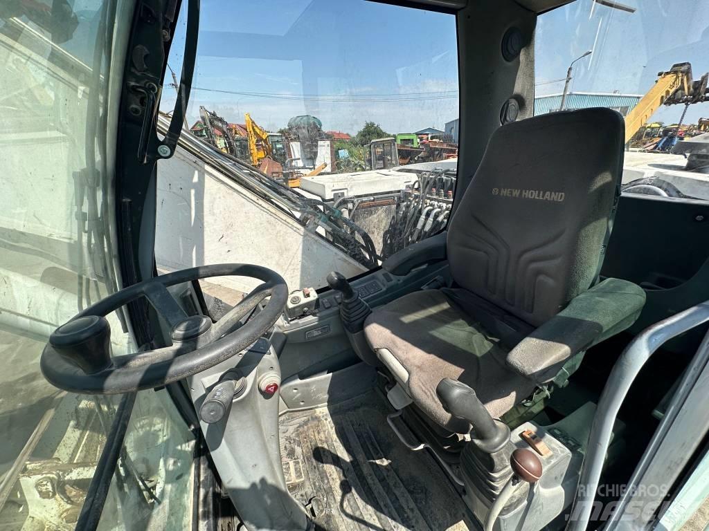 New Holland MH Plus Pelle sur pneus