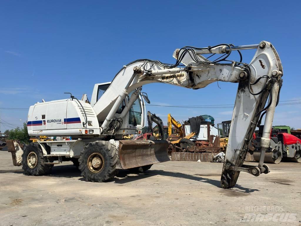New Holland MH Plus Pelle sur pneus