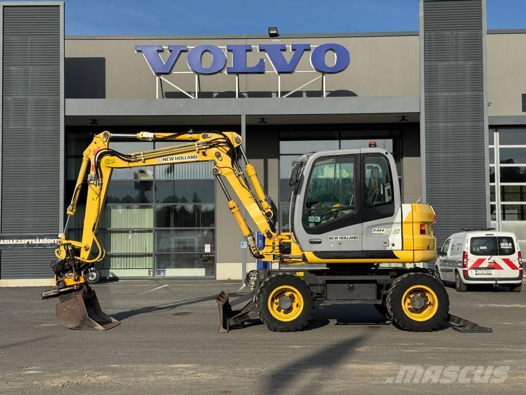 New Holland MH 2.6 Pelle sur pneus