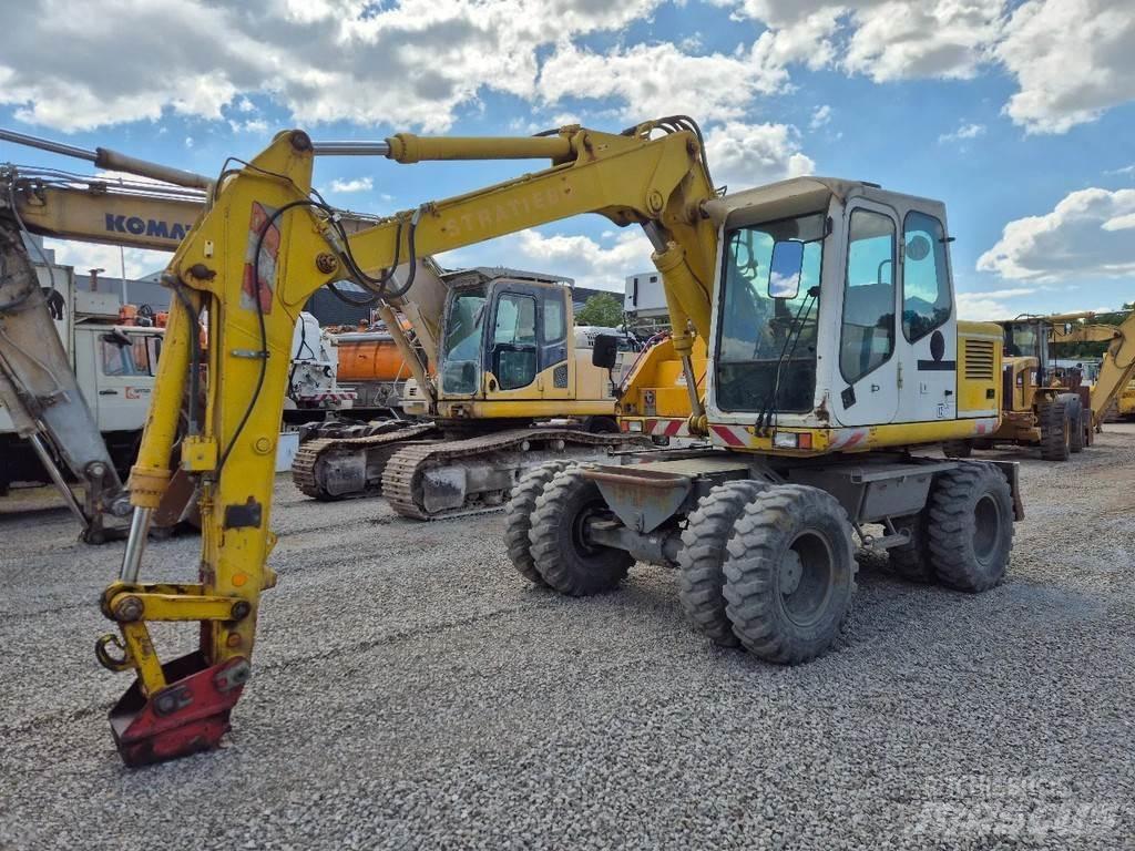 Atlas 1204 Pelle sur pneus