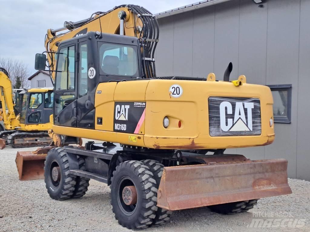 CAT M 316 D Pelle sur pneus