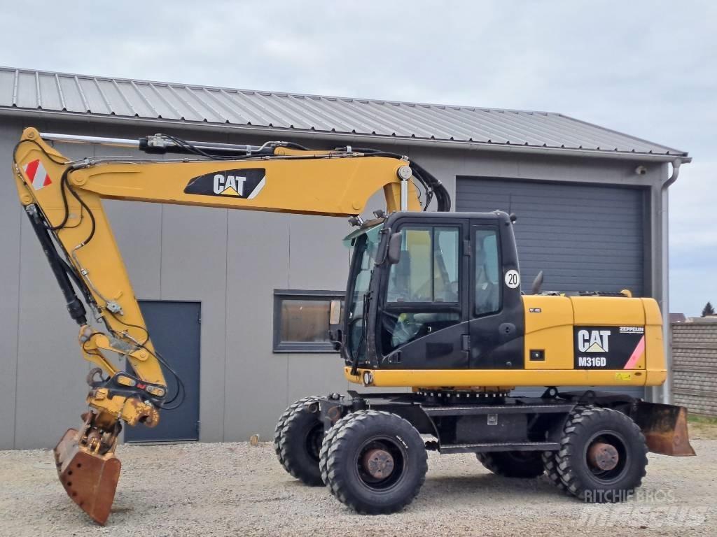 CAT M 316 D Pelle sur pneus