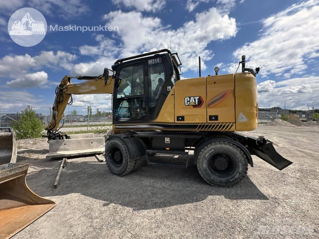 CAT M 314 Pelle sur pneus