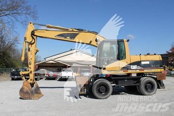 CAT M318C Pelle sur pneus