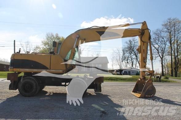 CAT M318C Pelle sur pneus