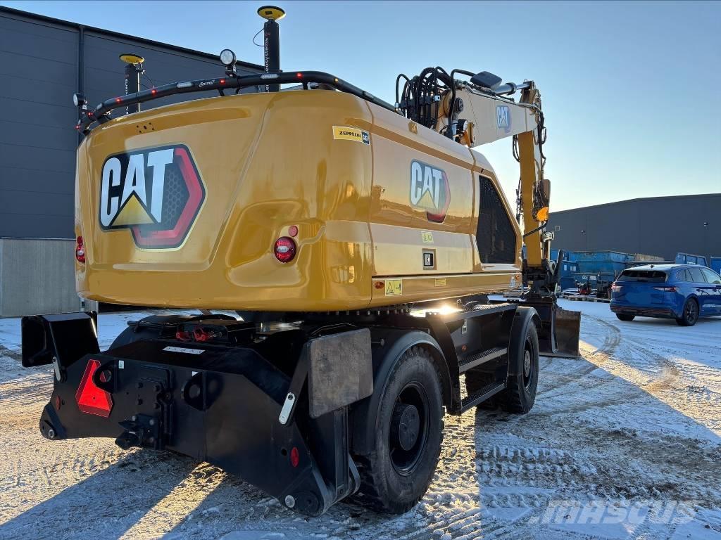 CAT M318 Pelle sur pneus