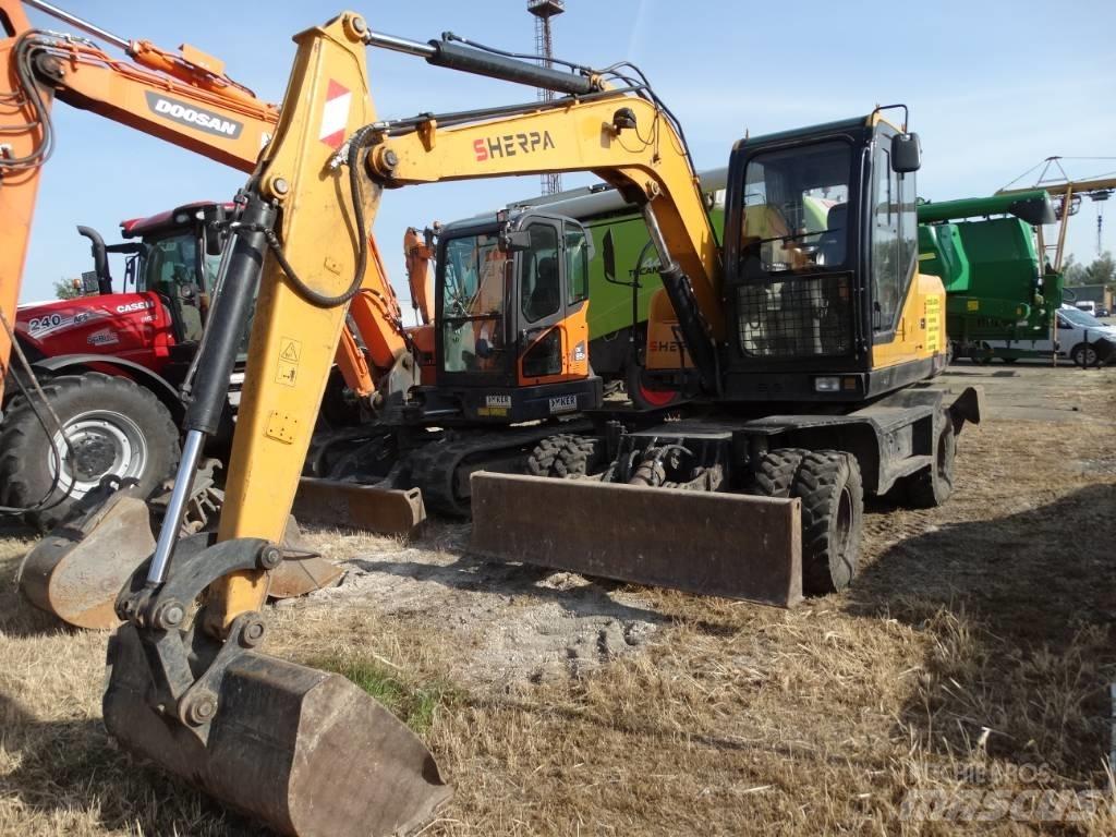 Sherpa EX70-4 Pelle sur pneus