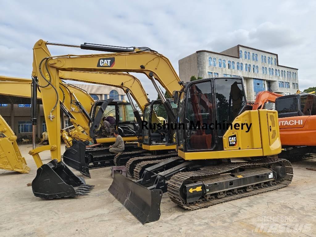 CAT 310 Pelle sur chenilles