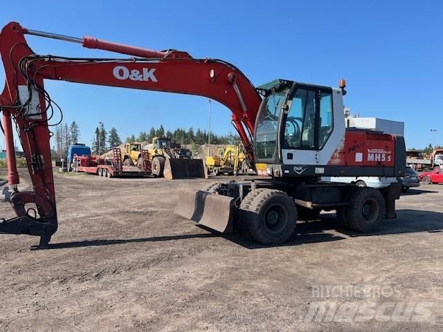 O&K MH 5,5 Pelle sur pneus