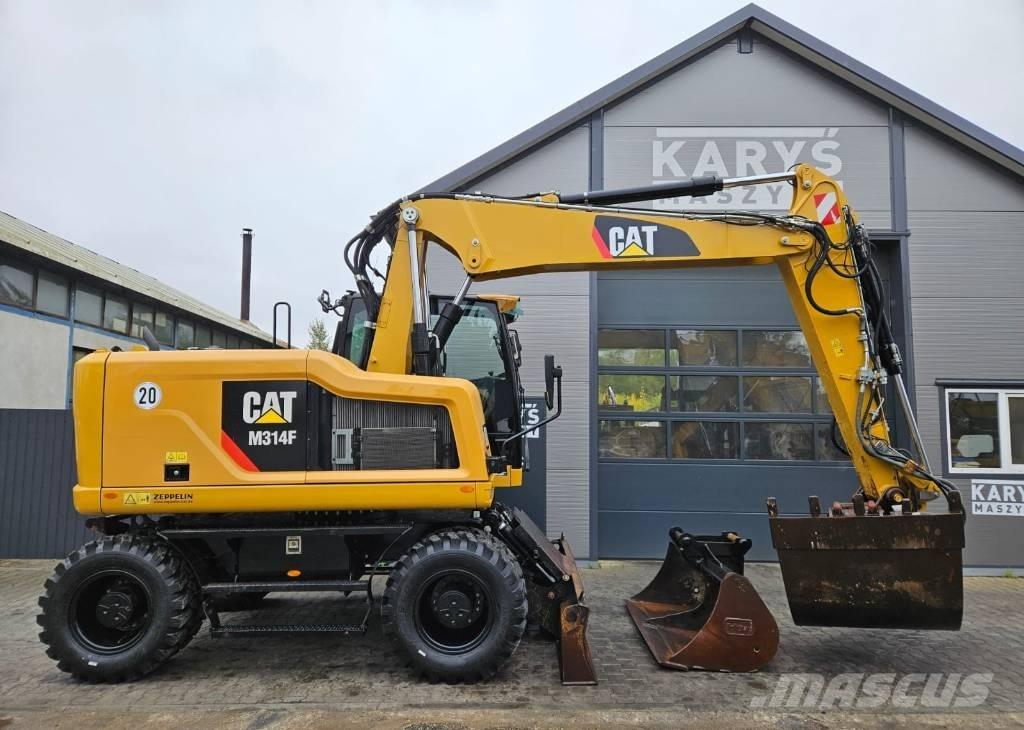 CAT M 314 Pelle sur pneus