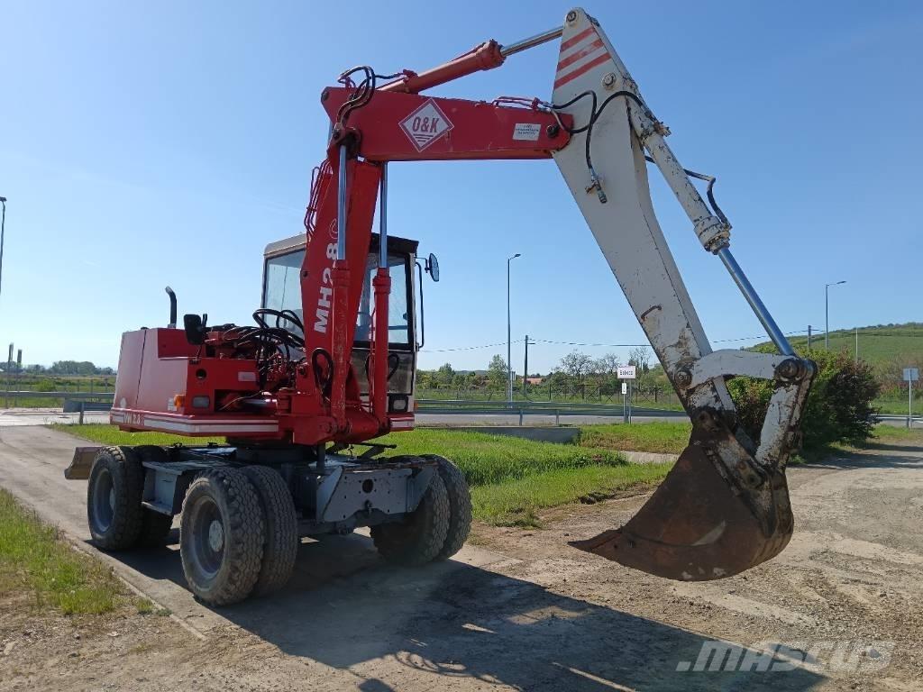 O&K MH2,8C Pelle sur pneus