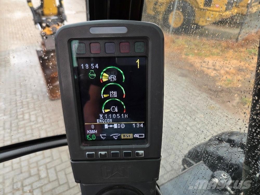 CAT M313D Pelle sur pneus