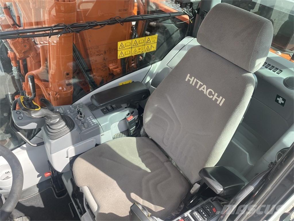 Hitachi ZX 140 W-6 Pelle sur pneus
