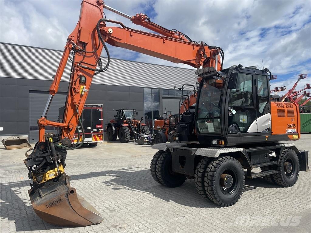 Hitachi ZX 140 W-6 Pelle sur pneus