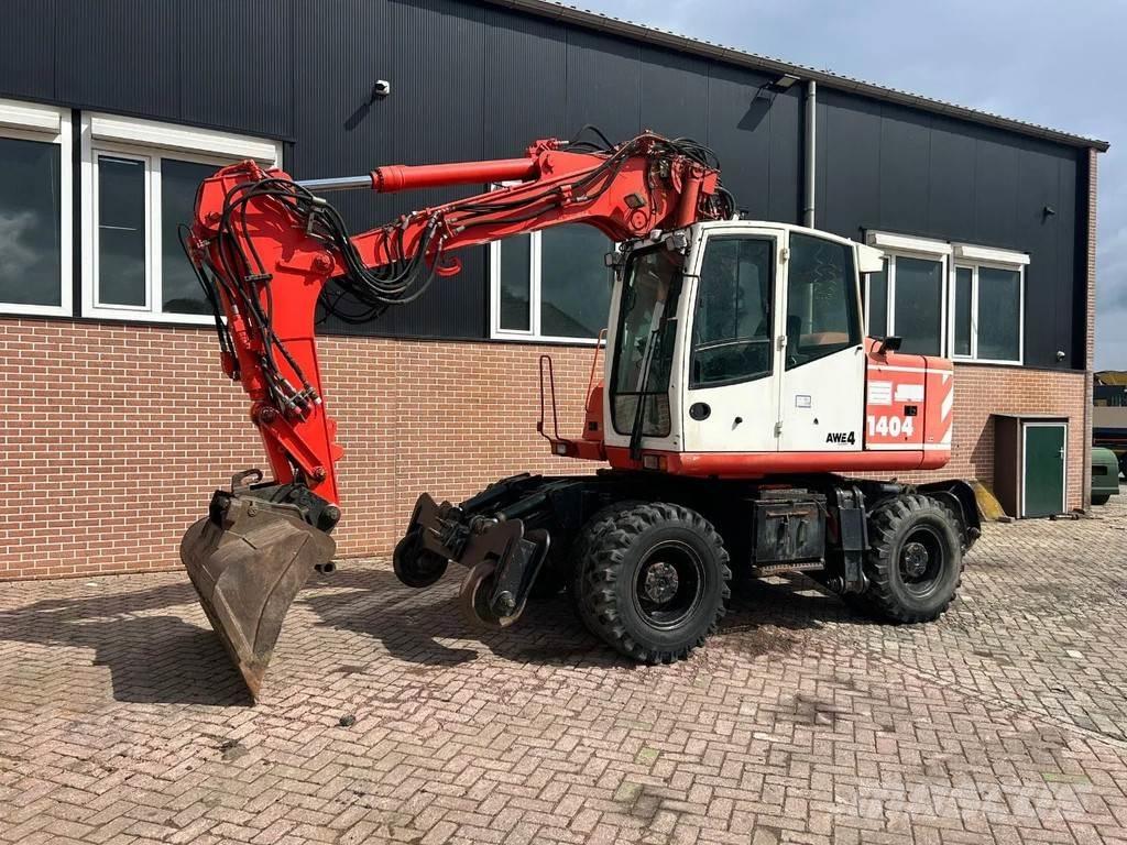 Atlas 1404 Pelle sur pneus