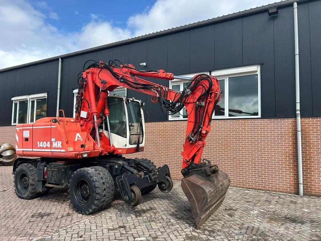 Atlas 1404 Pelle sur pneus