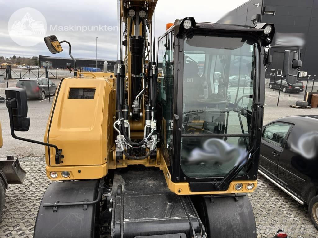 CAT M 315 Pelle sur pneus