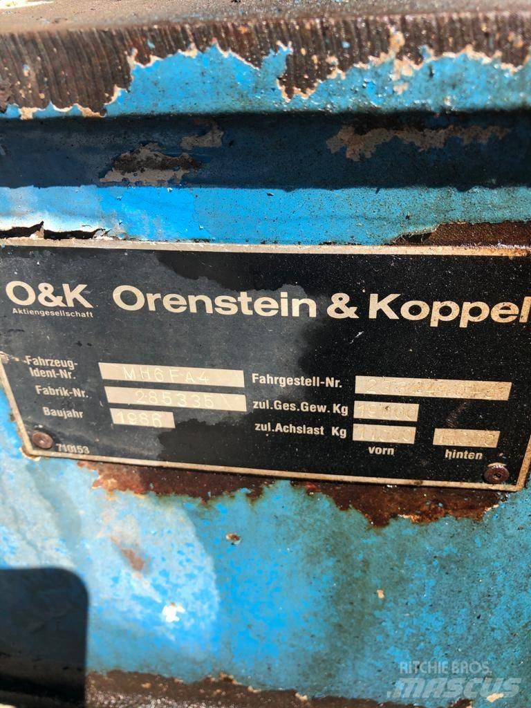 O&K MH6 FA4 Pelle sur pneus