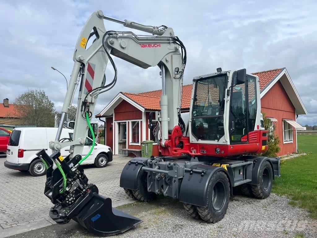 Takeuchi TB 395 W Pelle sur pneus