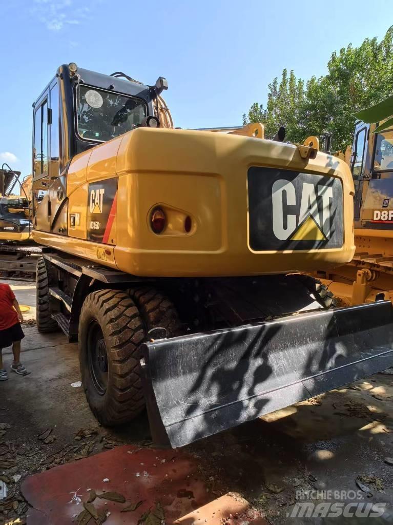 CAT 315 D Pelle sur pneus