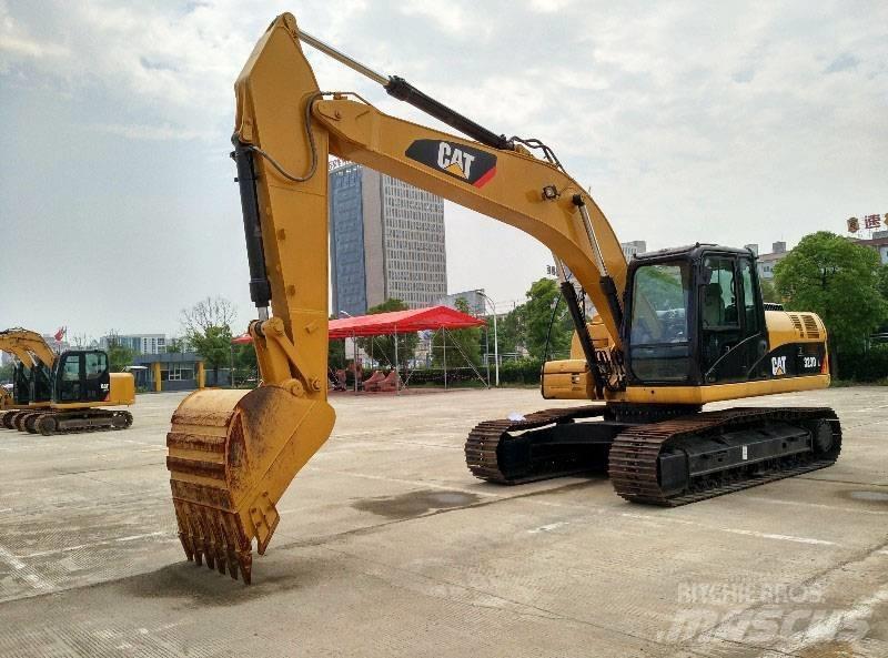 CAT 323 Pelle sur chenilles