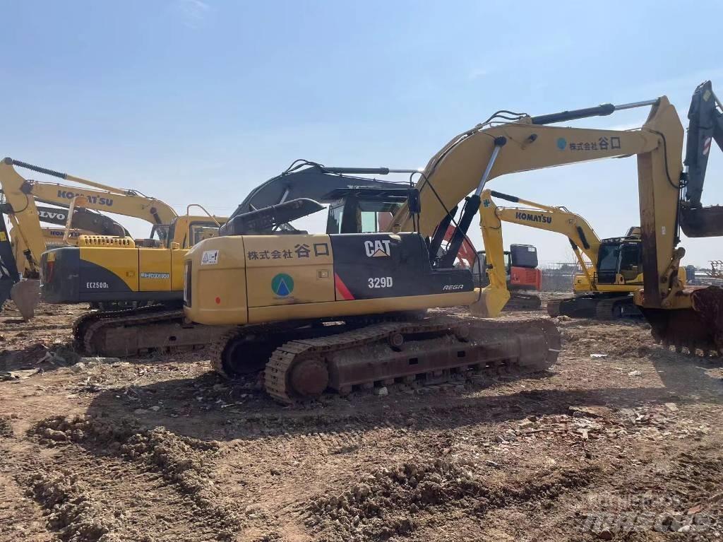 CAT 329d Pelle longue portée