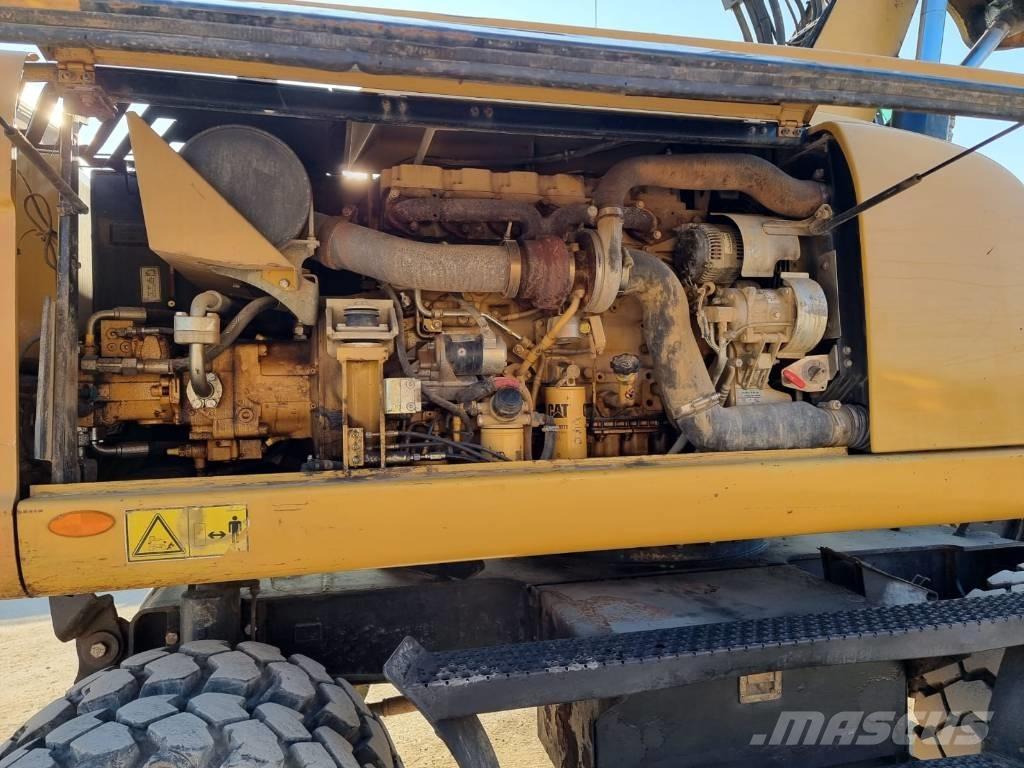 CAT M 316 D II Pelle sur pneus