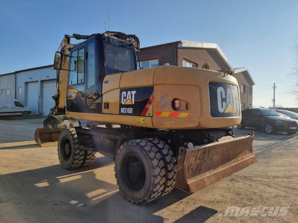 CAT M 316 D II Pelle sur pneus