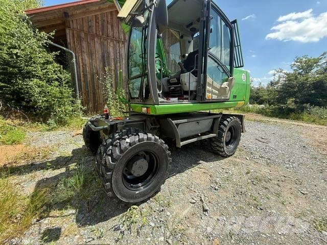 Atlas Mobilbagger Pelle sur pneus