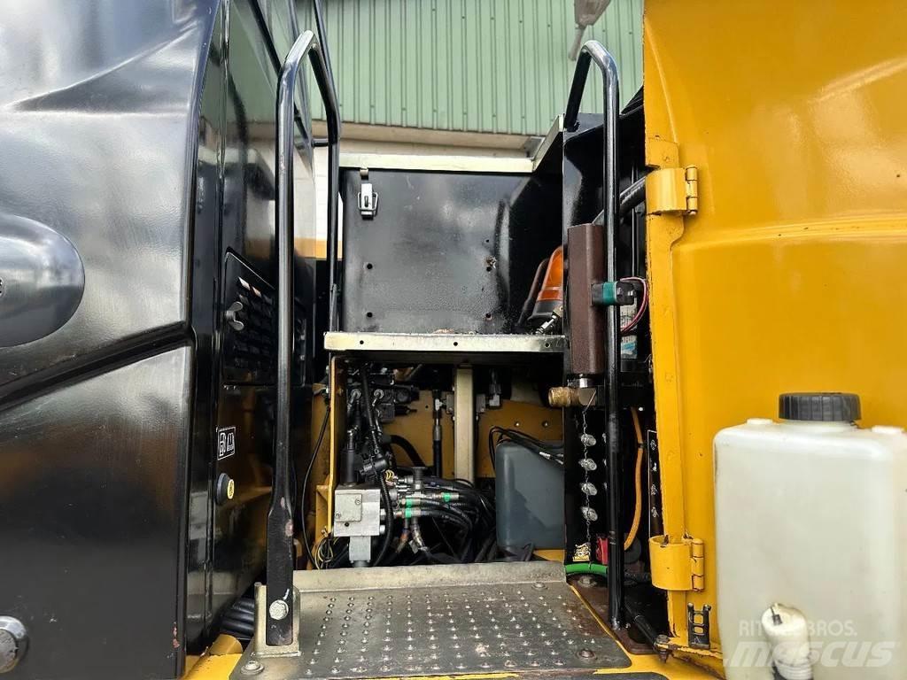 CAT M313D Pelle sur pneus