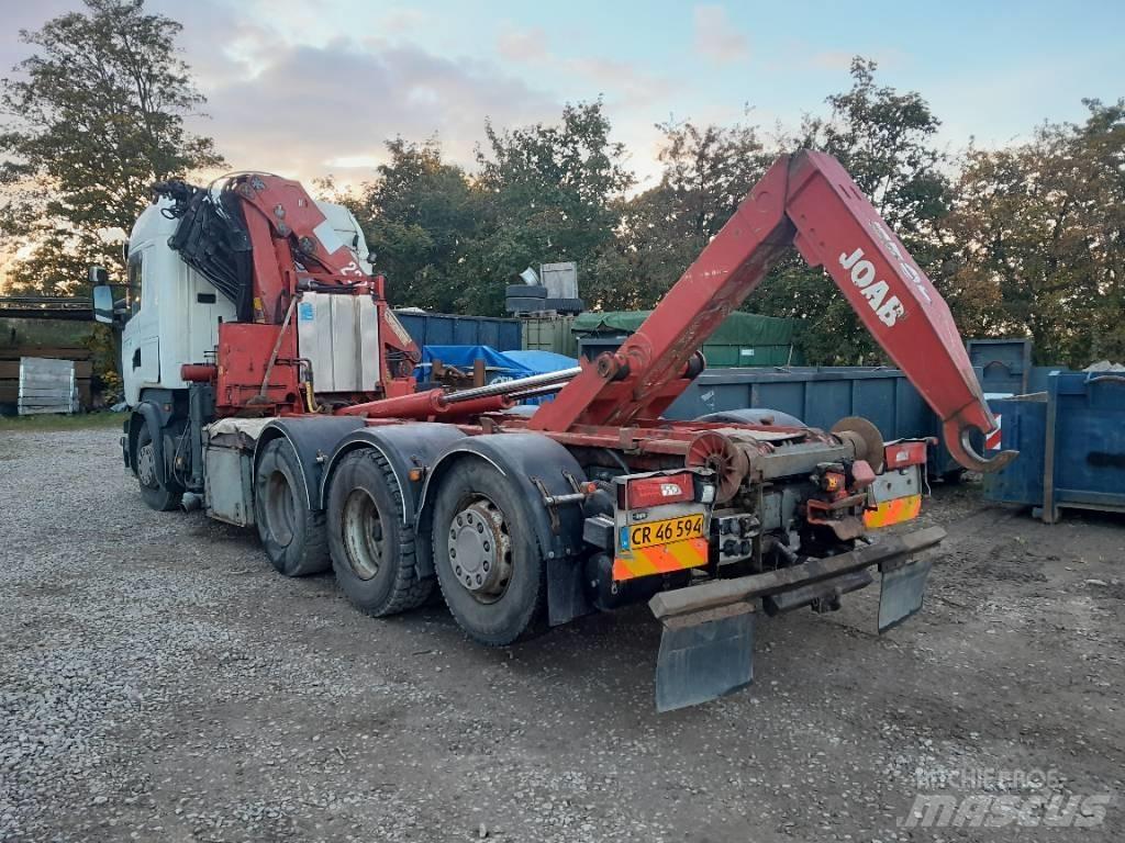 Scania R 520 Camion plateau ridelle avec grue