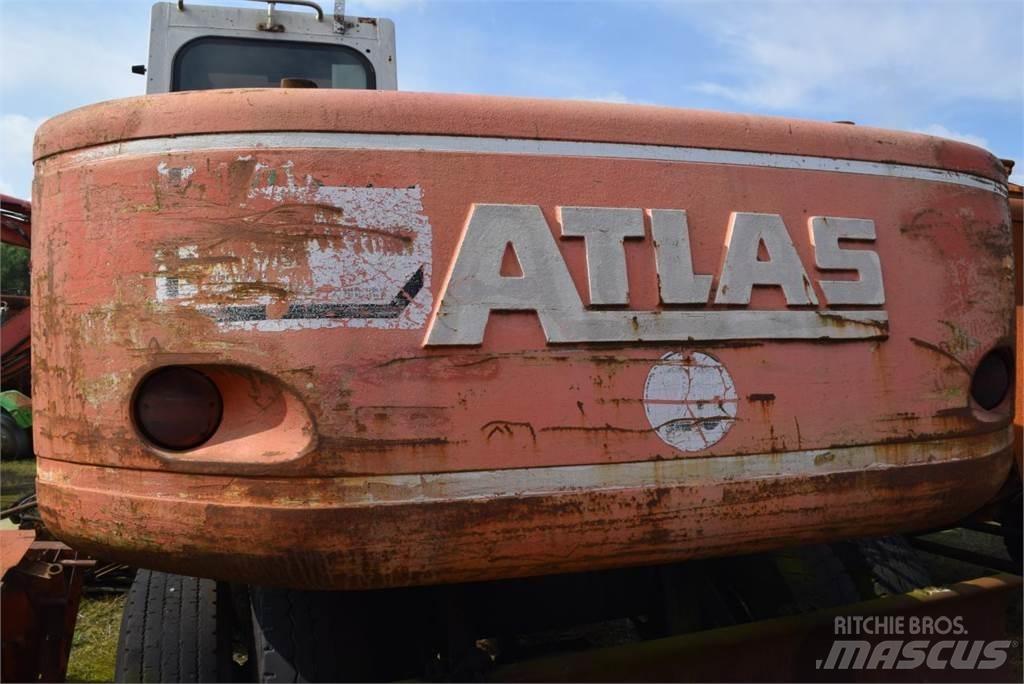 Atlas 1404 M Pelle sur pneus