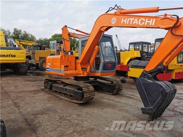 Hitachi EX60 Pelle sur chenilles