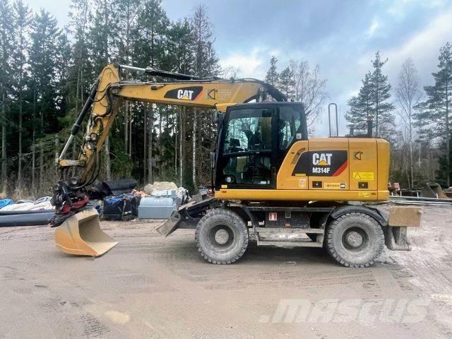CAT M 314 F Pelle sur pneus