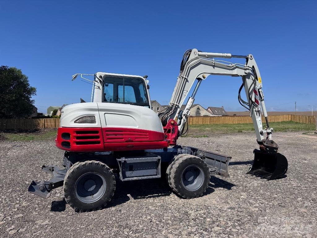 Takeuchi TB 295 W Pelle sur pneus