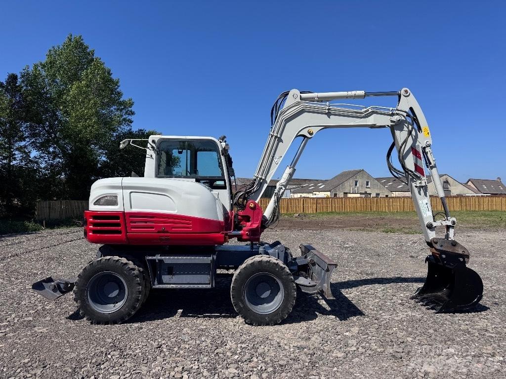 Takeuchi TB 295 W Pelle sur pneus