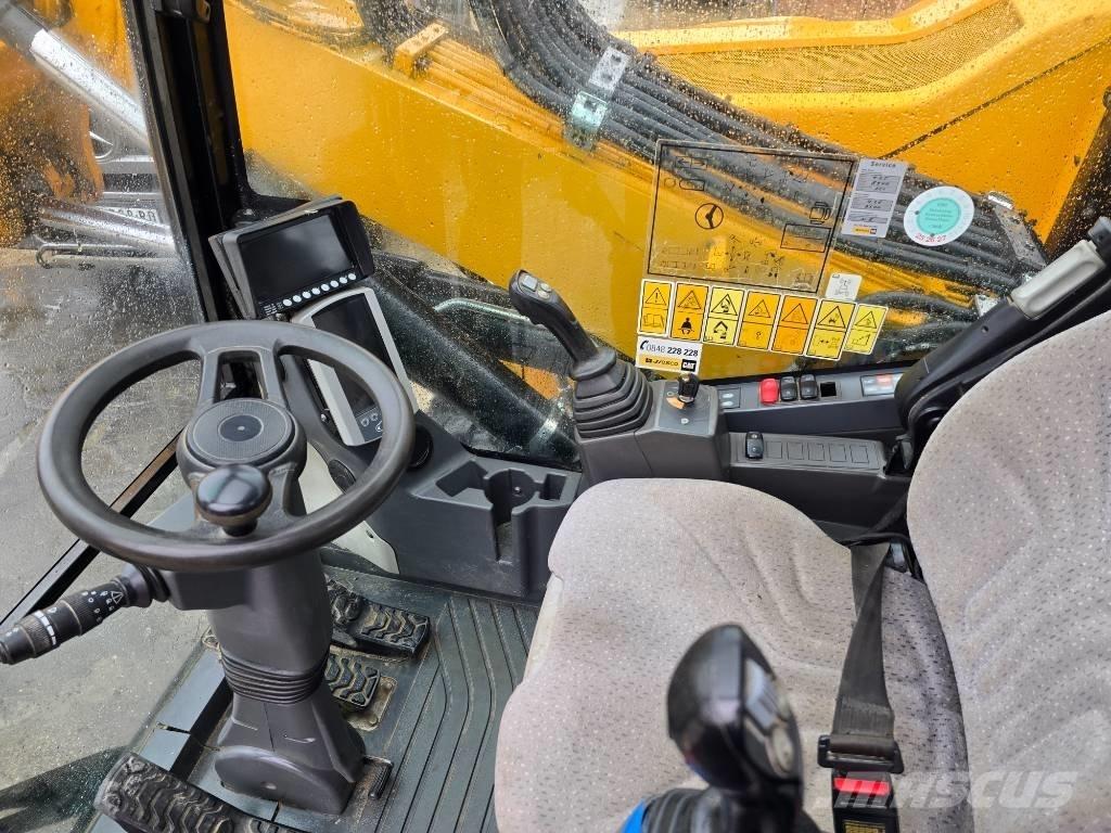 CAT M 315 F Pelle sur pneus