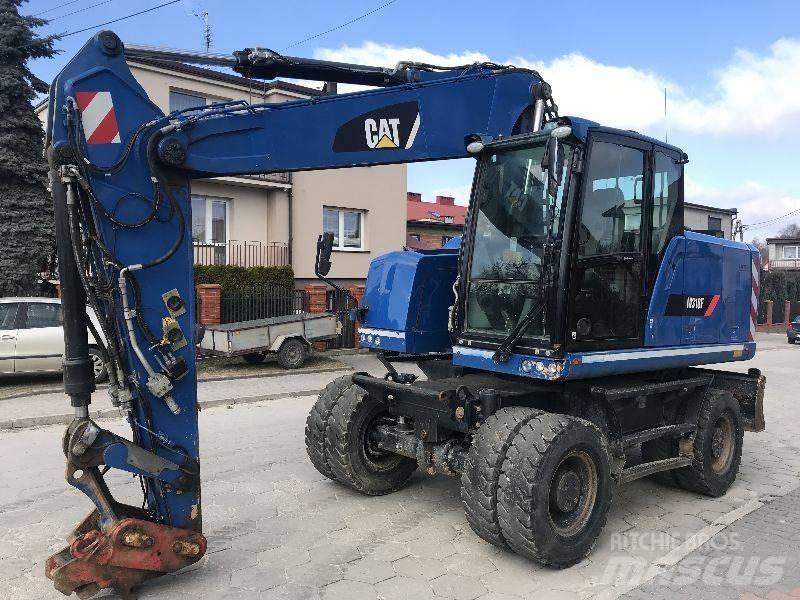 CAT M318f 318 f Pelle sur pneus