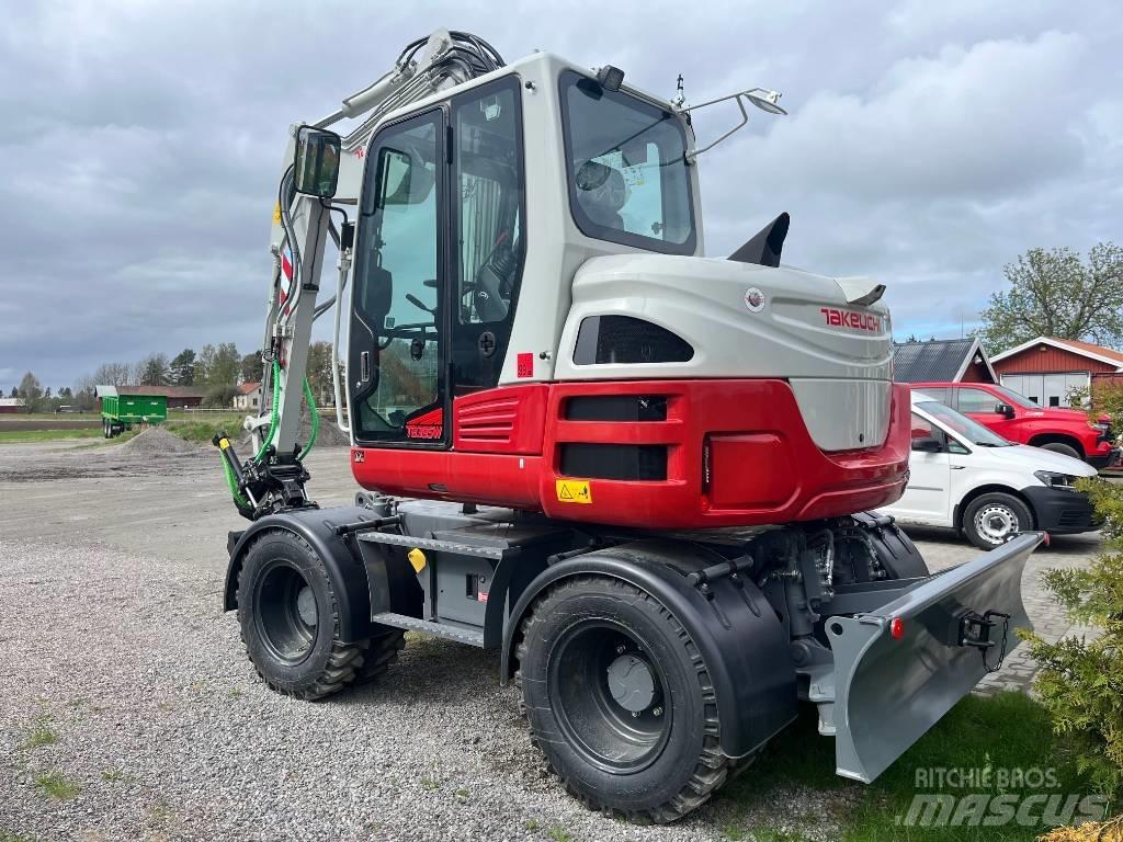 Takeuchi TB 395 W Pelle sur pneus