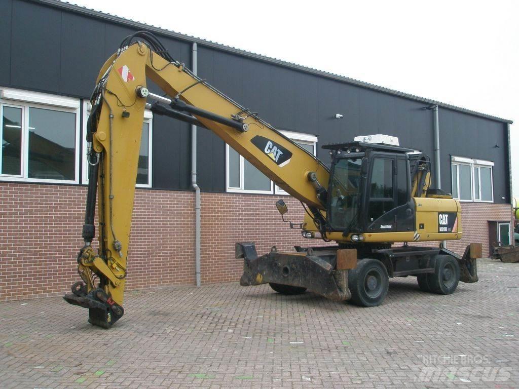 CAT M318D Pelle sur pneus