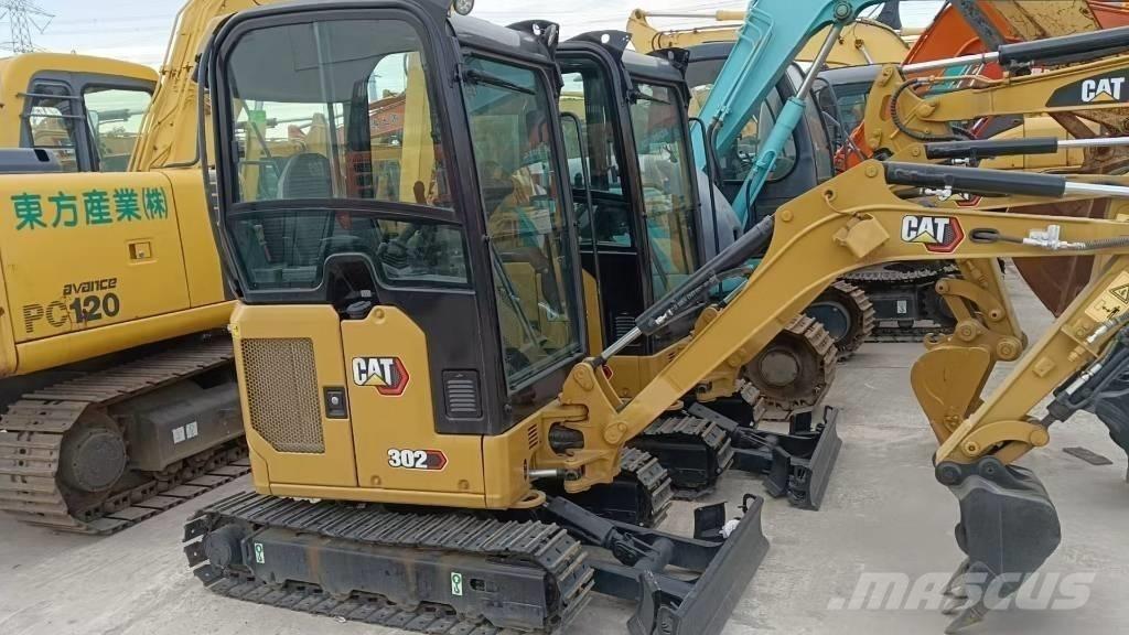 CAT 302D Pelle sur chenilles